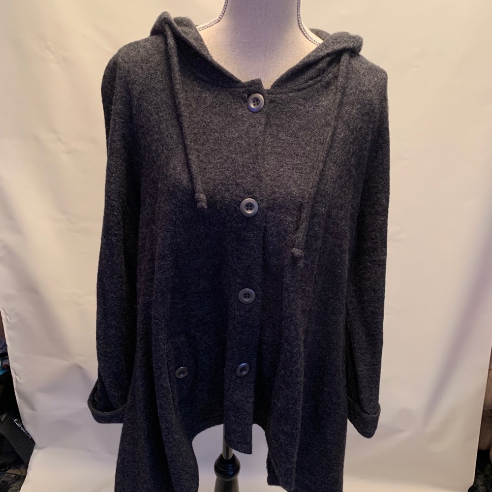 long sweater with a  hoodie